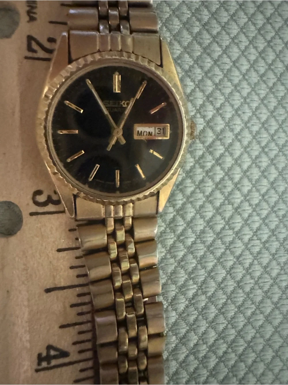 Seiko Gold-Tone Watch with Black Dial